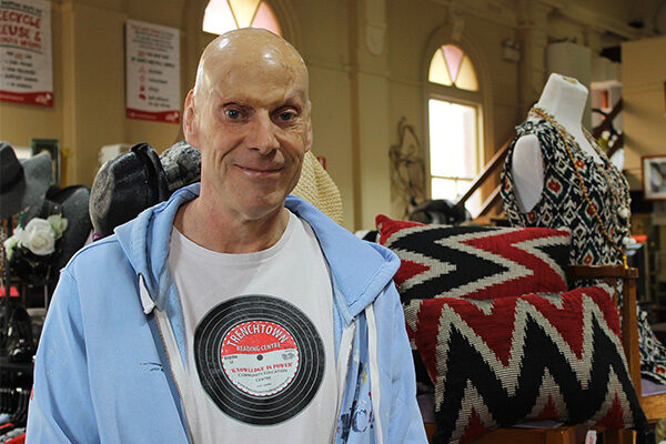 Op shop volunteer Dave Holland