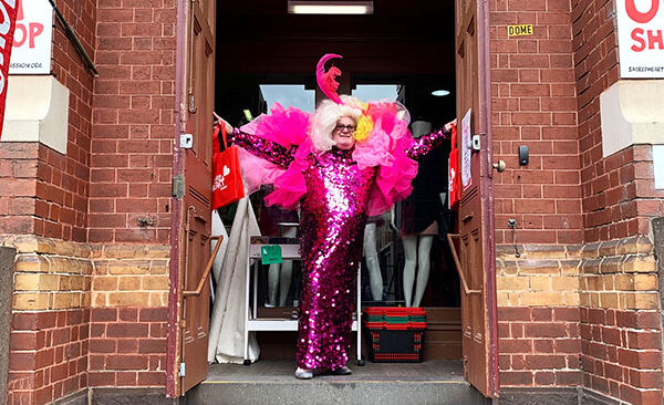 paul-wearing-drag-queen-costume Op shop staff member dressed as a drag queen