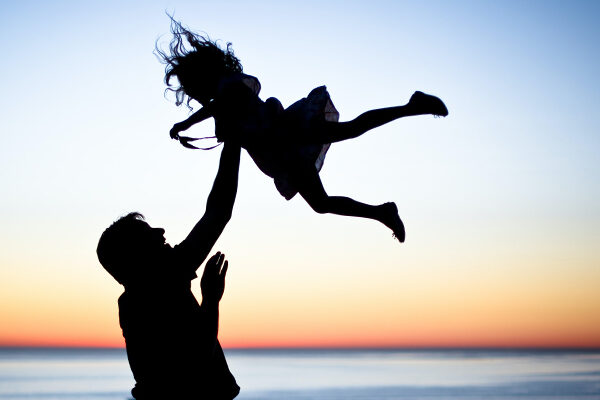 client-fred-and-daughter J2SI participant Fred and his daughter playing at the beach