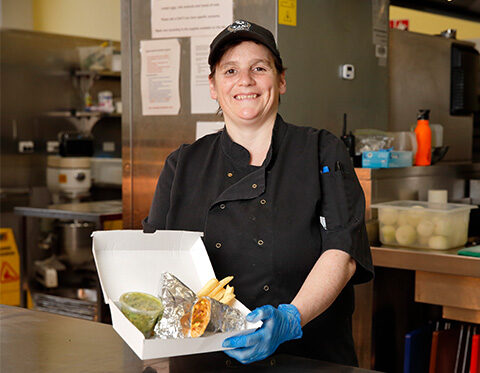 Meals Program Chef Kirsty with a takeaway meal