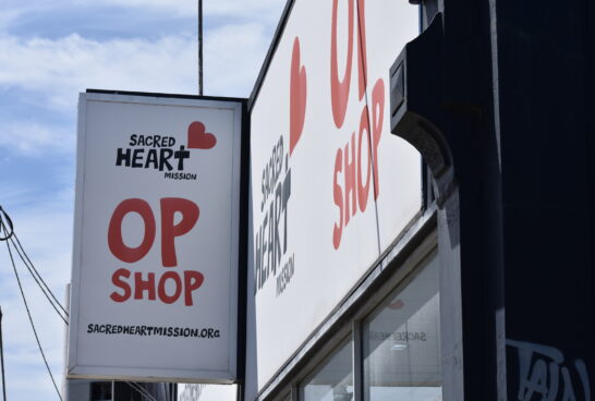 a large op shop sign