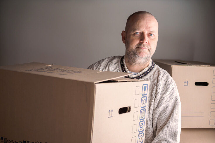 Man carrying moving boxes