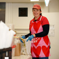 Dining hall volunteer packing meals