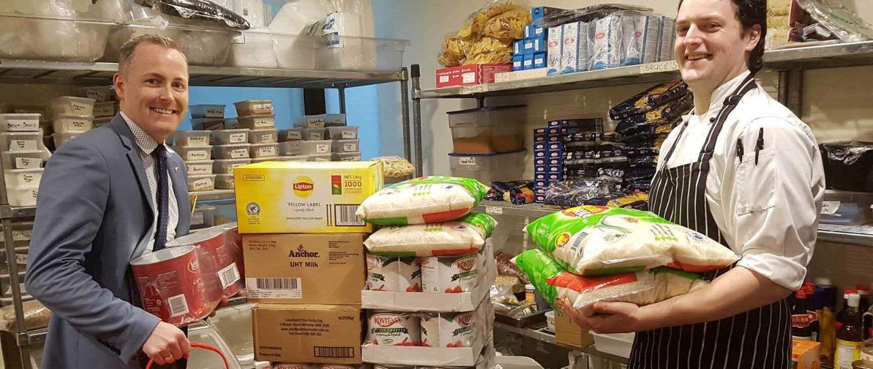 A donor drops off food donations to the dining hall