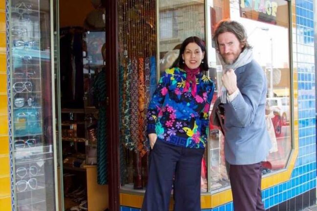 Tracey at store Tracey standing outside of her St Kilda store with musician Tim Rogers