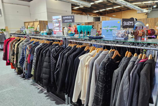 Racks of jackets inside the open plan of sacred heart mission coburg op shop