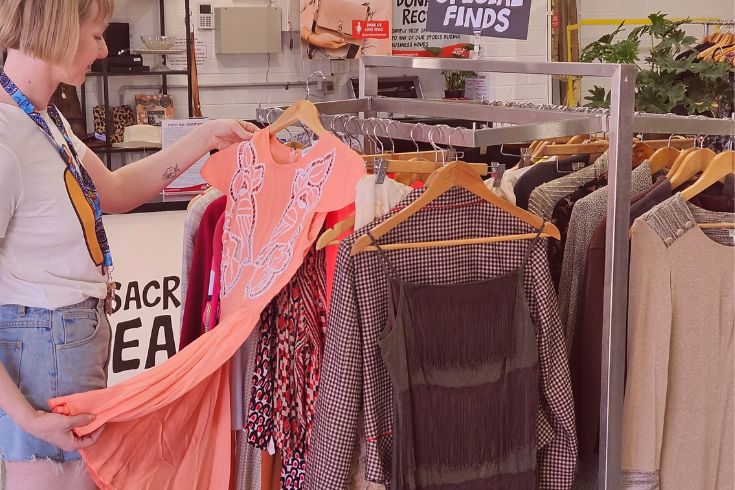 Woman admiring pink dress